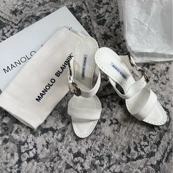 Manolo sandals size 41/11 in white.Perfect condition-comes with box and dust bag